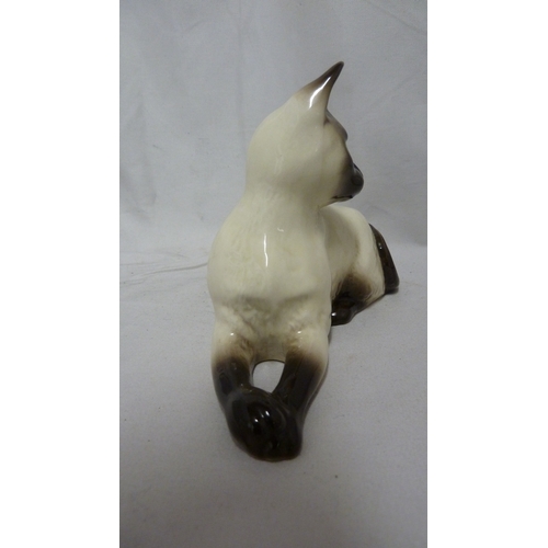 54 - A Beswick pottery figure of a Siamese cat, numbered 1558, 18.5cm max.