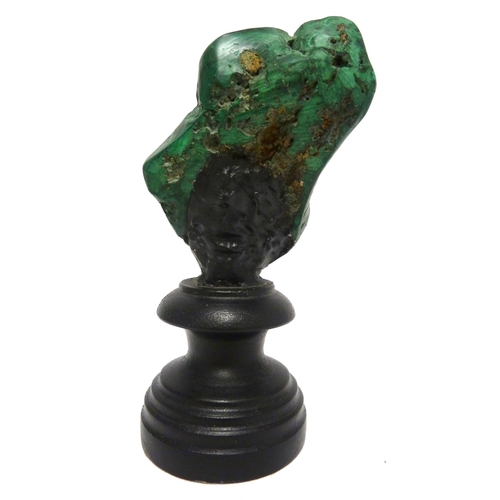 48 - A polished Russian malachite geode boulder, 17cm high in stand.