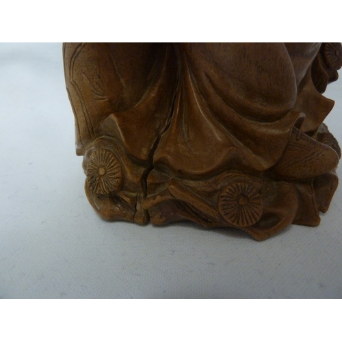 46 - A Bamboo root carving of a female figure with a dog, 22cm high approx.