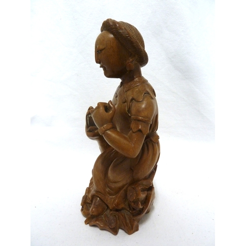 46 - A Bamboo root carving of a female figure with a dog, 22cm high approx.