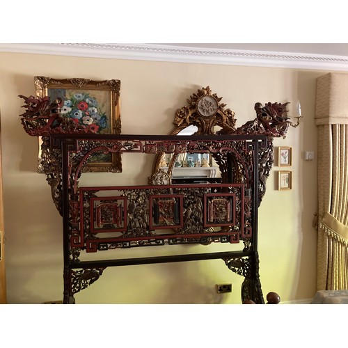 40 - A large Chinese carved and lacquered wood room divider screen, modern, export seal attached, 2.02m x... 