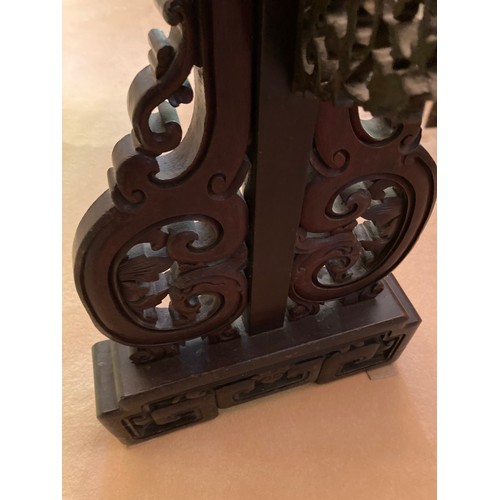 40 - A large Chinese carved and lacquered wood room divider screen, modern, export seal attached, 2.02m x... 