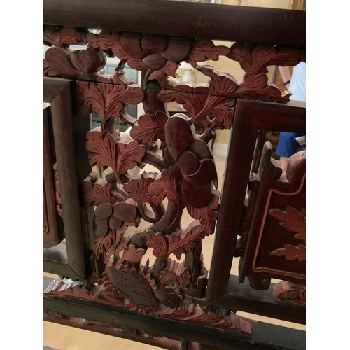 40 - A large Chinese carved and lacquered wood room divider screen, modern, export seal attached, 2.02m x... 