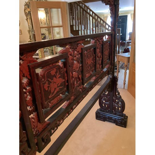 40 - A large Chinese carved and lacquered wood room divider screen, modern, export seal attached, 2.02m x... 