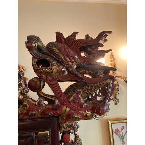 40 - A large Chinese carved and lacquered wood room divider screen, modern, export seal attached, 2.02m x... 