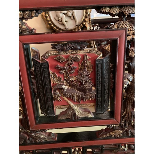 40 - A large Chinese carved and lacquered wood room divider screen, modern, export seal attached, 2.02m x... 