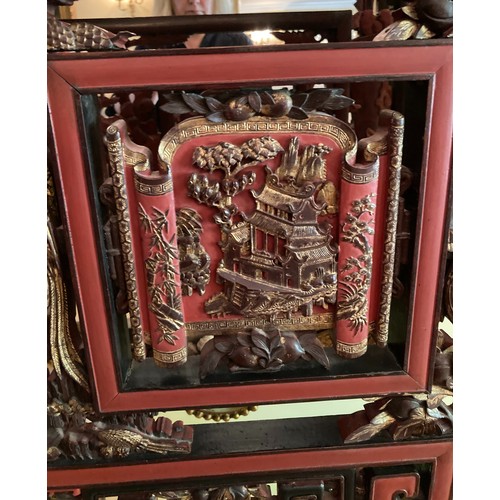 40 - A large Chinese carved and lacquered wood room divider screen, modern, export seal attached, 2.02m x... 