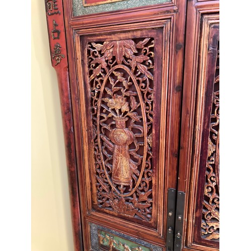 39 - A Chinese carved wood corner cabinet, 1 m 71 cm h x 65 cm w x 38.5cm deep approx. 
**This item is he... 