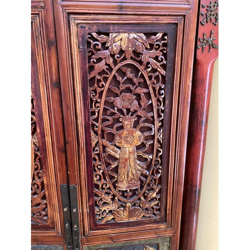 39 - A Chinese carved wood corner cabinet, 1 m 71 cm h x 65 cm w x 38.5cm deep approx. 
**This item is he... 