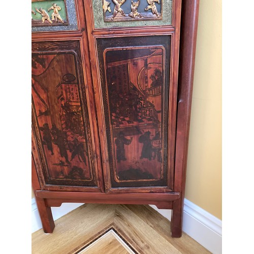 39 - A Chinese carved wood corner cabinet, 1 m 71 cm h x 65 cm w x 38.5cm deep approx. 
**This item is he... 