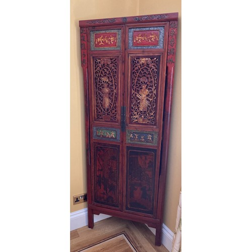 39 - A Chinese carved wood corner cabinet, 1 m 71 cm h x 65 cm w x 38.5cm deep approx. 
**This item is he... 