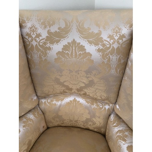 129 - WITHDRAWN - A Wing Back Chair upholstered in pale yellow silk. ** see image 2 for true colour. This ... 