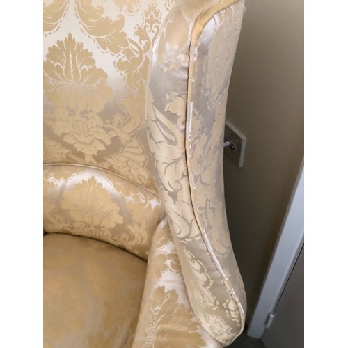 129 - WITHDRAWN - A Wing Back Chair upholstered in pale yellow silk. ** see image 2 for true colour. This ... 