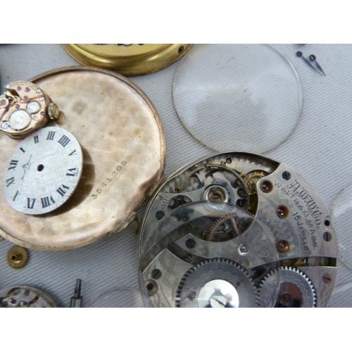 14 - Restorers Box - a quantity of pocket watch and wrist watch parts, movements, including a dark blue e... 