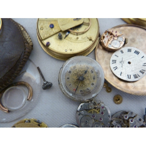 14 - Restorers Box - a quantity of pocket watch and wrist watch parts, movements, including a dark blue e... 