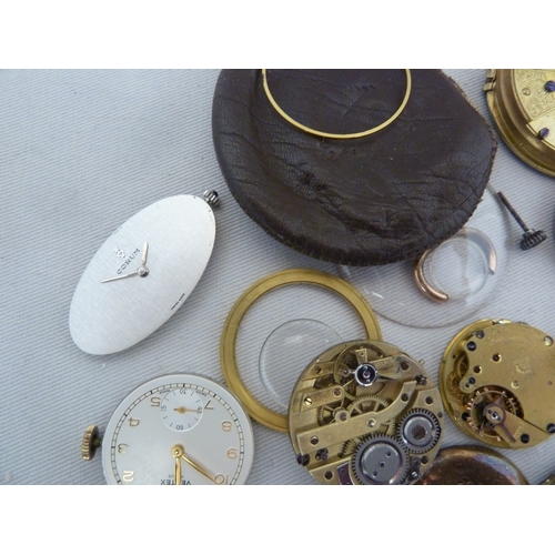 14 - Restorers Box - a quantity of pocket watch and wrist watch parts, movements, including a dark blue e... 