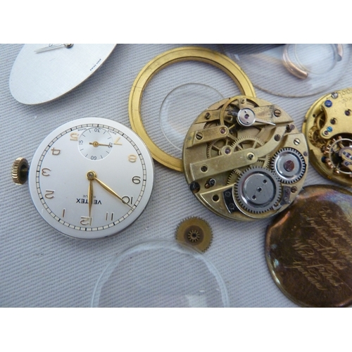 14 - Restorers Box - a quantity of pocket watch and wrist watch parts, movements, including a dark blue e... 