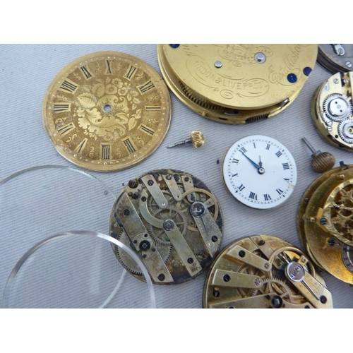 16 - Restorers Box - a quantity of Pocket watch spare parts and movements, including dials marked for Tho... 