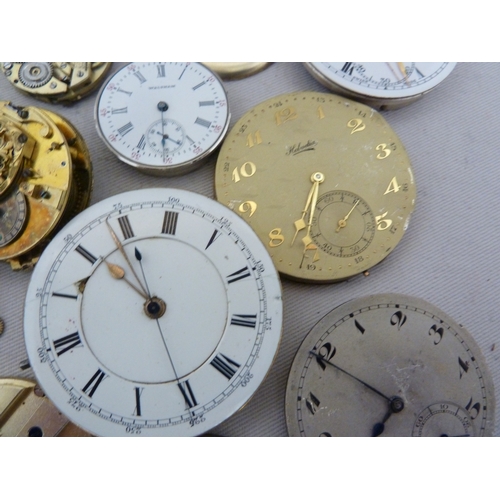 16 - Restorers Box - a quantity of Pocket watch spare parts and movements, including dials marked for Tho... 