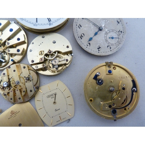 16 - Restorers Box - a quantity of Pocket watch spare parts and movements, including dials marked for Tho... 