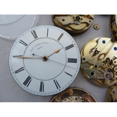 16 - Restorers Box - a quantity of Pocket watch spare parts and movements, including dials marked for Tho... 