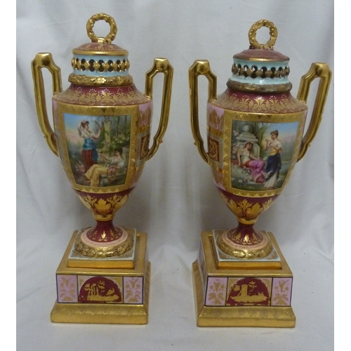 53 - A Pair of Continental Porcelain 'Vienna' vases and covers, decorated with reserves of Classical maid... 