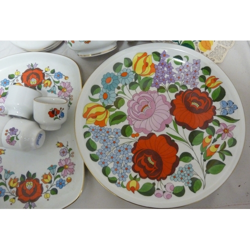 67 - Mid Century Design - A group of Hungarian Ceramics, all decorated in bright colours with stylised fl... 