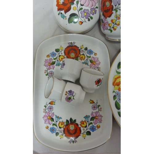 67 - Mid Century Design - A group of Hungarian Ceramics, all decorated in bright colours with stylised fl... 