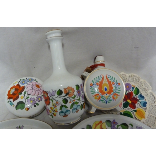 67 - Mid Century Design - A group of Hungarian Ceramics, all decorated in bright colours with stylised fl... 