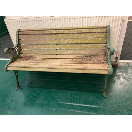 108 - Cast end wooden slatted garden bench