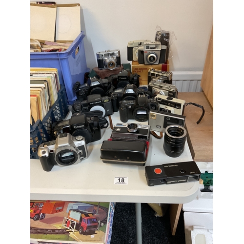 18 - Large quantity of vintage Canon, Kodak and other cameras