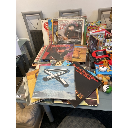 28 - Large quantity assorted records, including war of the worlds, shadows, country albums, Motown and ot... 