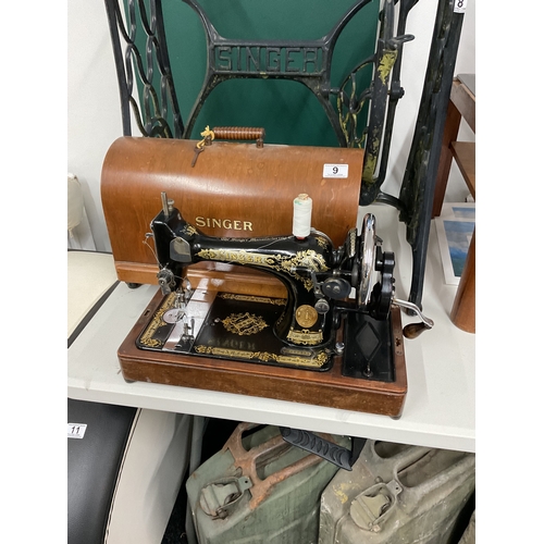 9 - Cased singer sewing machine