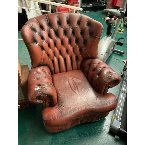 120 - Brown leather button back Chesterfield armchair