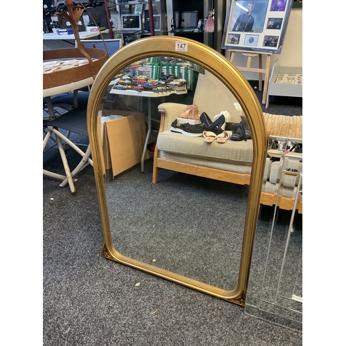 147 - Gilt bevel edged over mantle mirror