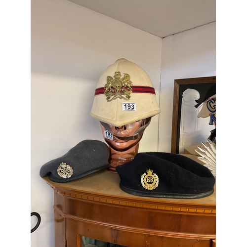 193 - British Pith helmet with royal crest and two others