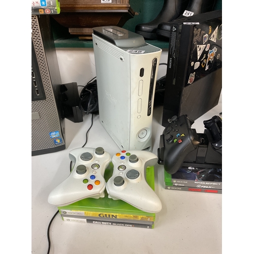 248 - Xbox 360 with games and controllers