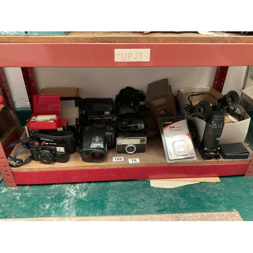 78 - Shelf of vintage cameras