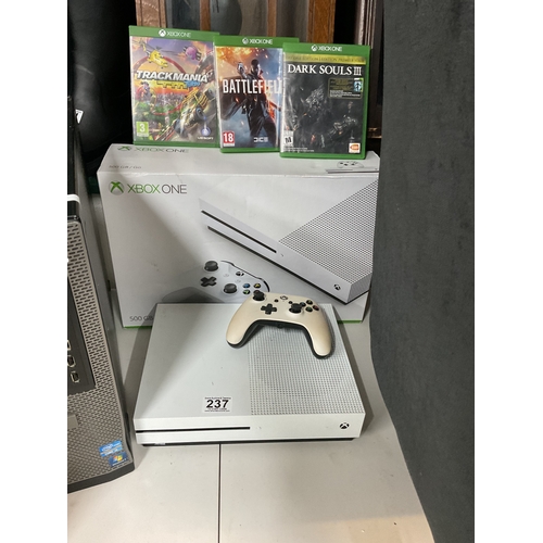 237 - Xbox one with box and games