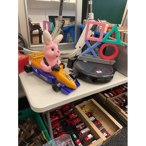 72 - Novelty Duracell bunny, Eufy robot vacuum, and retro style playstation light