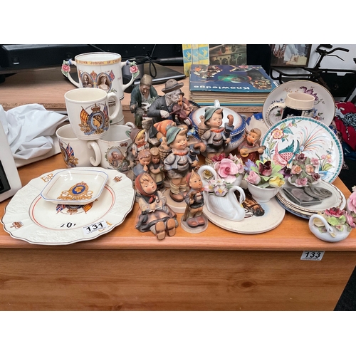 131 - Assorted Hummel figures, coins, etc