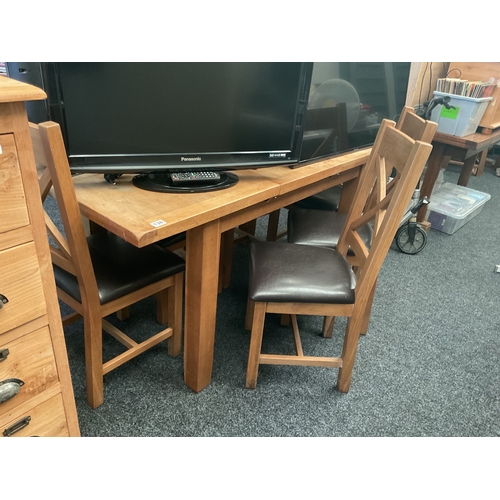 138 - Oak extending table and 6 chairs