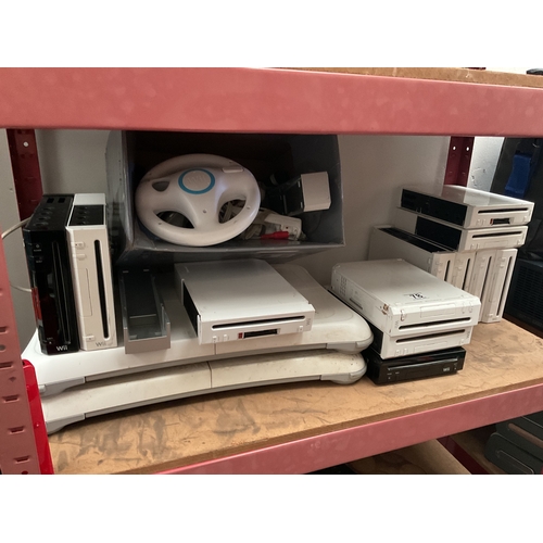 78 - Quantity Nintendo Wii consoles, Wii fit board, accessories etc