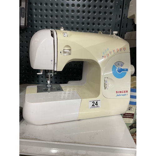 24 - electric featherweight sewing machine