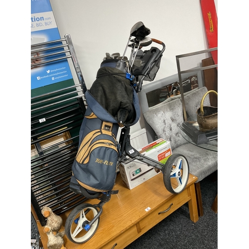 11 - Golf clubs, bag and trolley