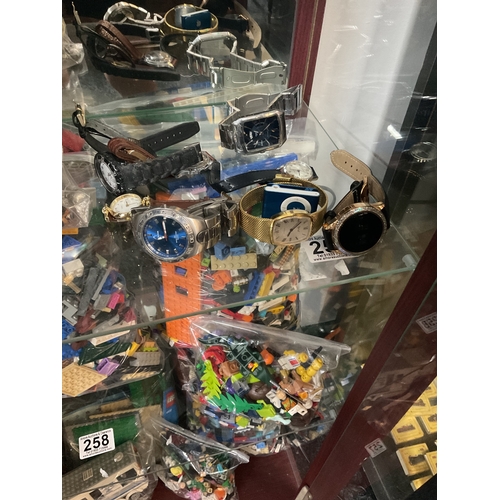 259 - Assorted wrist watches, smart watch, iPod nano, etc