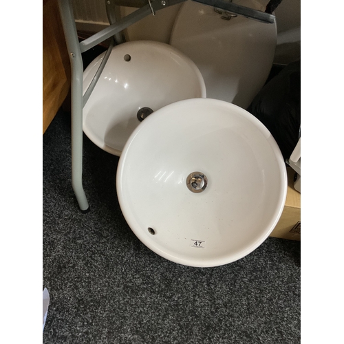 47 - 2 x round porcelain sinks and toilet seats