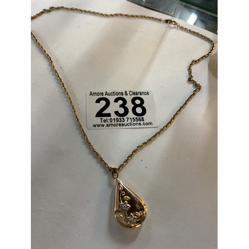 238 - 9ct Gold locket and chain, 4.5g