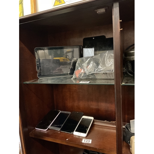 125 - 2 shelves phones and tablets