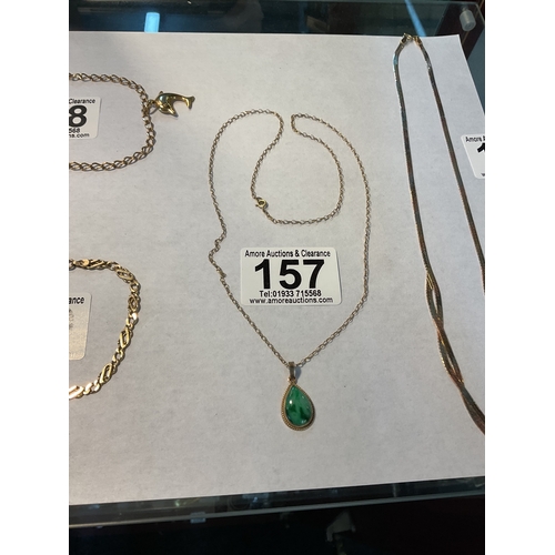 157 - 9ct gold green stone pendant, and 9ct chain 2.3g